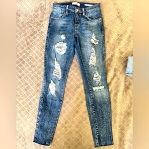 Ripped Guess Jeans distressed finish and a skinny Size 25